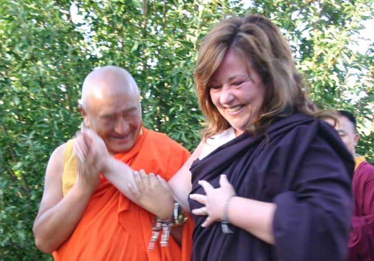 HH Ngawang Tenzin - holding hand and laughter